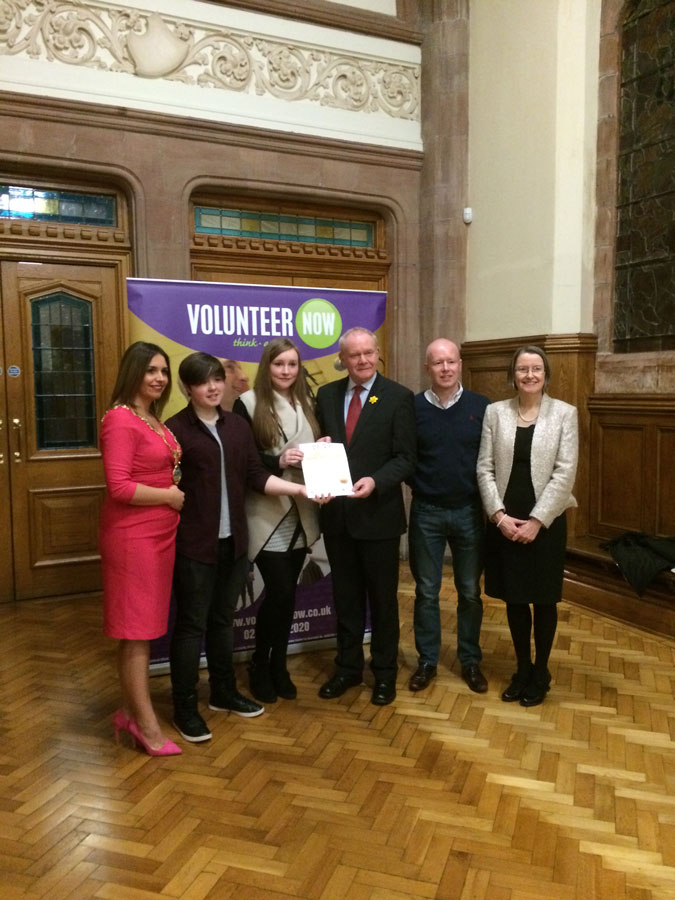 Keava Toland and Charlotte McKeever receiving the Millennium Gold Volunteer Award in the Guildhall